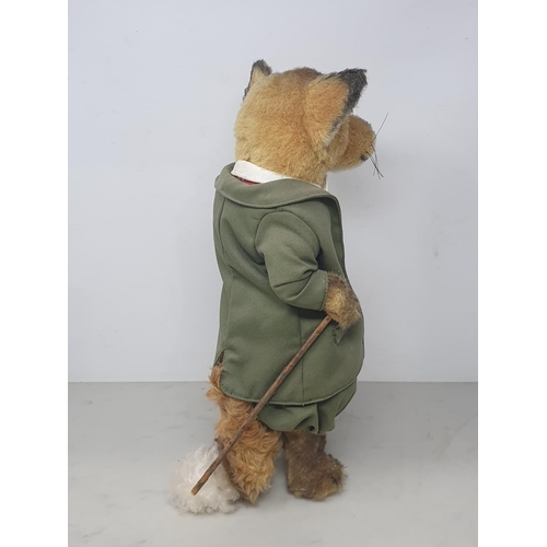 647 - A Steiff Fox in green Jacket, Pantaloons and red Waistcoat with button in ear 14 1/2in H