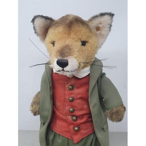 647 - A Steiff Fox in green Jacket, Pantaloons and red Waistcoat with button in ear 14 1/2in H