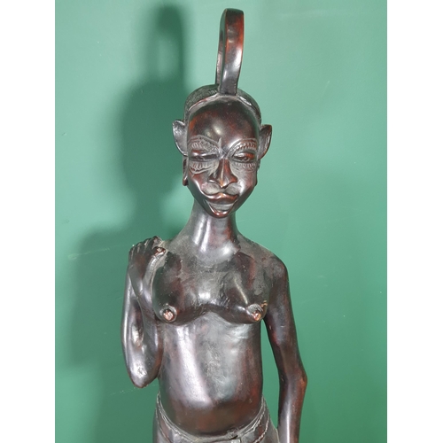 654 - A carved Gambian female Figure with pierced headdress, 4ft 2in H