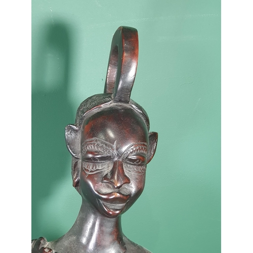 654 - A carved Gambian female Figure with pierced headdress, 4ft 2in H