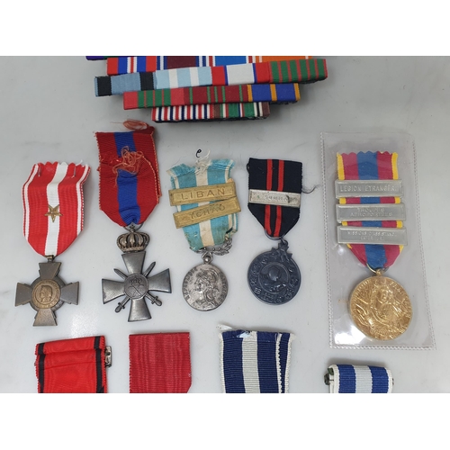 659 - Nine European Military Medals including Cross of Merit of the order of the Lion (Norway), Greek 1940... 