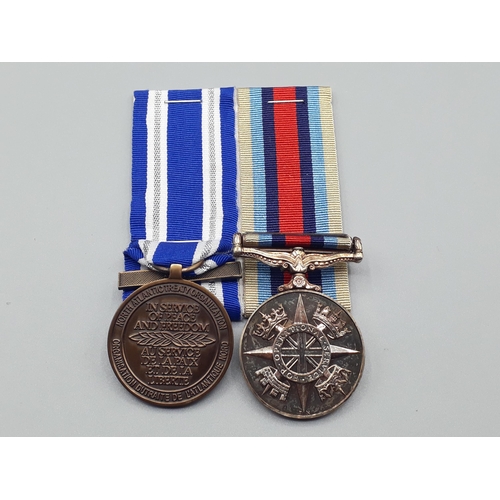 696 - Two; Operational Service Medal with 'Afghanistan' Clasp and NATO Medal with 'ISAF' Clasp engraved to... 