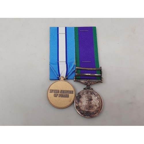 728 - Two; Campaign Service Medal with 'South Arabia' and 'Northern Ireland' Clasps and UN Medal engraved ... 