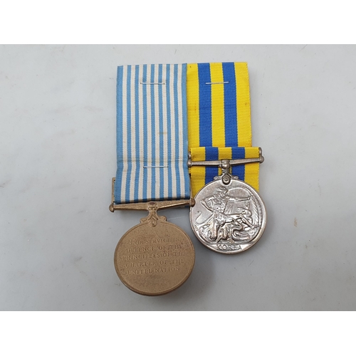 732 - Two; Queen's Korea Medal and UN Korea Medal engraved to 22308461 Pte. J.C.K. Robinson, Argyll & Suth... 