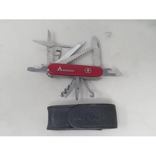 744 - A Swiss Army 'Camping' multi-tool Penknife and a Leatherman 'Supertool' multitool Pocketknife