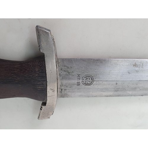 749 - A WWII SA Dagger in brown scabbard with wooden grip lacking emblem, blade engraved 'RZM M7/85'