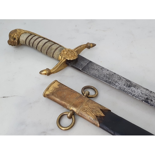 751 - A Victorian Royal Navy Midshipman's Dirk with shagreen grip in brass mounted leather scabbard 22 3/4... 