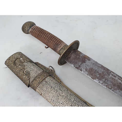 758 - A 19th Century Chinese Short Sword with brass mounted shagreen scabbard, leafage engraved brass guar... 