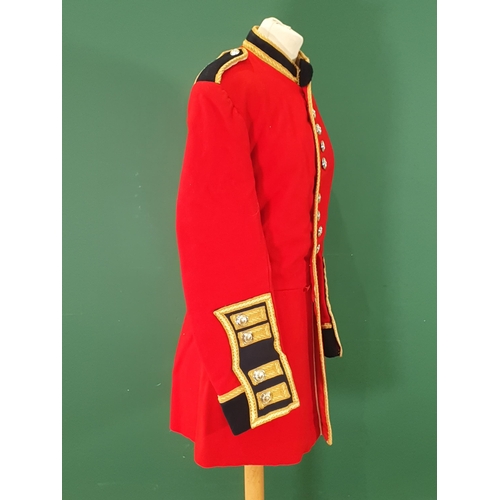 764 - A Welsh Guards scarlet Tunic with stay bright buttons