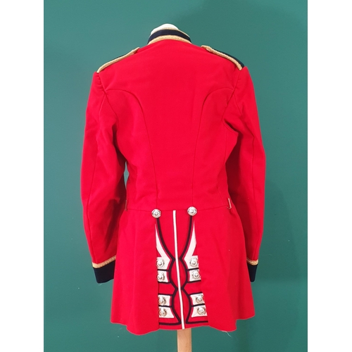 764 - A Welsh Guards scarlet Tunic with stay bright buttons