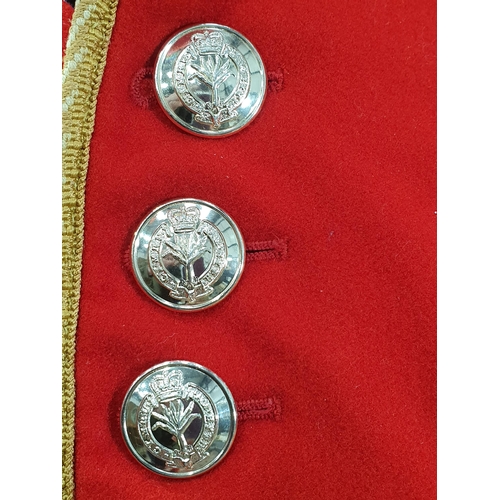 764 - A Welsh Guards scarlet Tunic with stay bright buttons