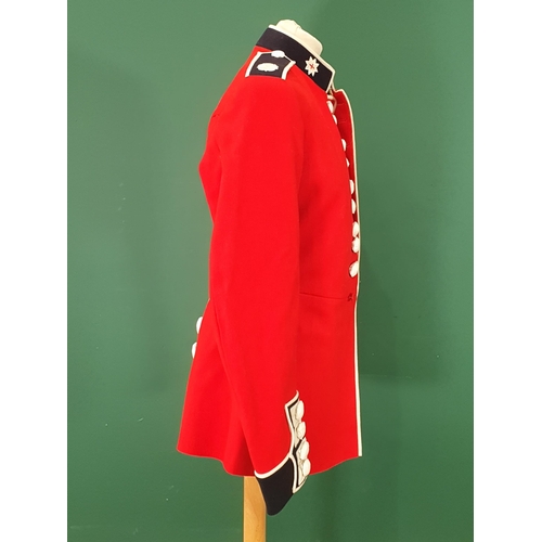 768 - A Coldstream Guards scarlet Tunic with staybright buttons. Unworn with buttons still wrapped in tiss... 