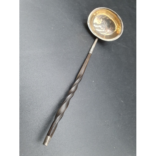 77 - A Georgian Toddy Ladle with coin inset bowl, engraved initials, baluster turned wood handle, and a G... 