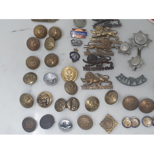 779 - A quantity of mainly British Army Buttons, Shoulder Badges and other Badges including 'The King's Ow... 