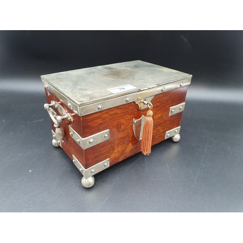 78 - A Victorian plated mounted oak Tea Caddy with scroll engraved lid enclosing two lidded divisions, or... 