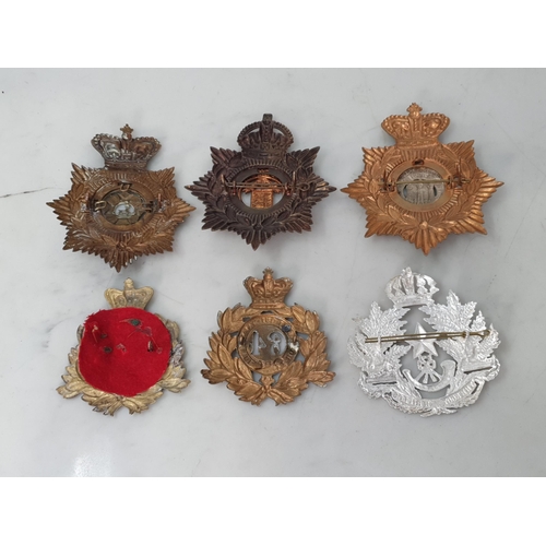 792 - Six other ranks Helmet Plates including Bedfordshire Regiment, Royal Guernsey Light Infantry, The Sc... 