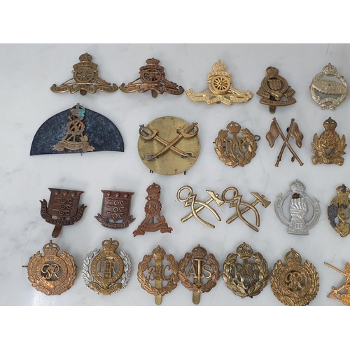 794 - A collection of British Corps Badges