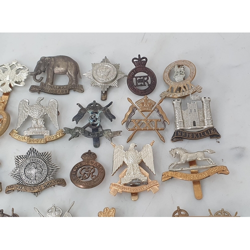 797 - A collection of British Army Cavalry Badges