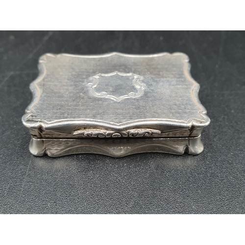 80 - A Victorian silver rectangular Vinaigrette with engine turning and vacant cartouche, scroll pierced ... 