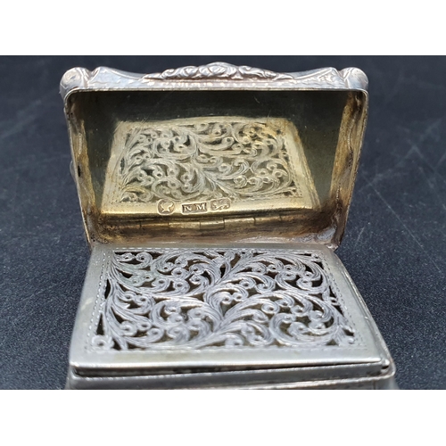 80 - A Victorian silver rectangular Vinaigrette with engine turning and vacant cartouche, scroll pierced ... 