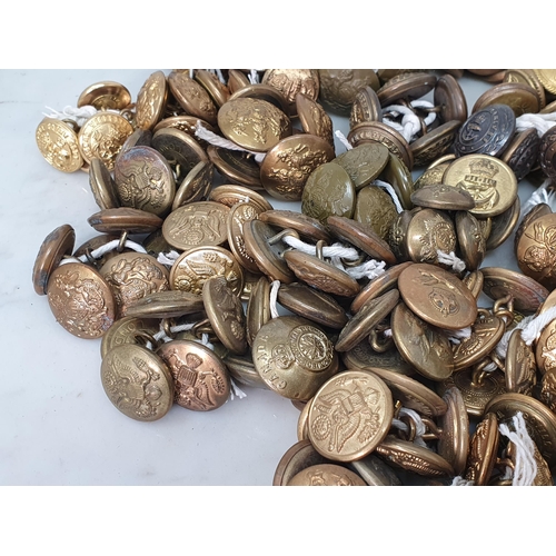 804 - A collection of British and American military brass Buttons