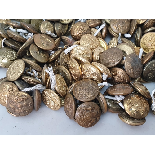 804 - A collection of British and American military brass Buttons