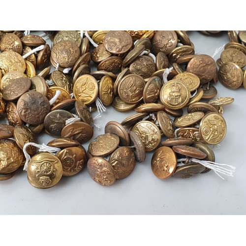 804 - A collection of British and American military brass Buttons