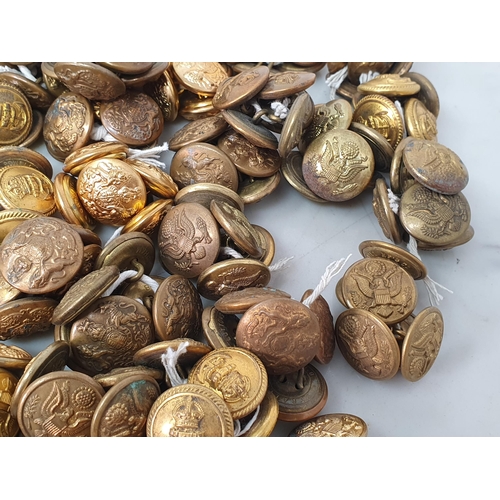 804 - A collection of British and American military brass Buttons