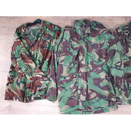 819 - Four British Army camouflage Combat Jackets