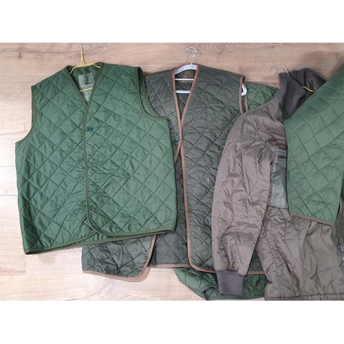 822 - Three British military quilted Waistcoats and three quilted Coats