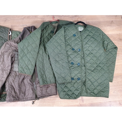 822 - Three British military quilted Waistcoats and three quilted Coats