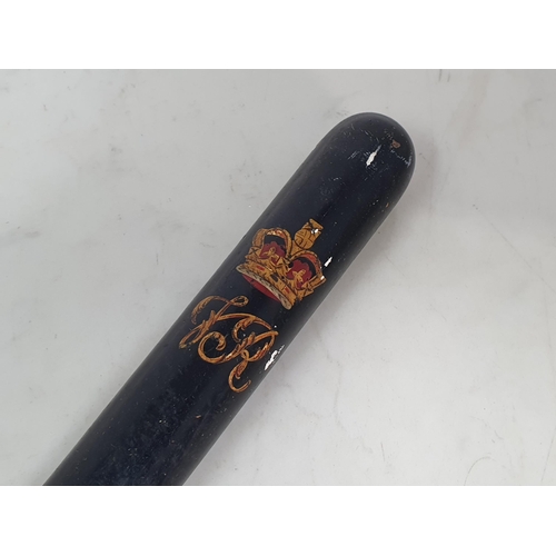 826 - A black painted Victorian Police Truncheon with V.R. Crown insignia and unpainted ribbed grip 15 1/4... 