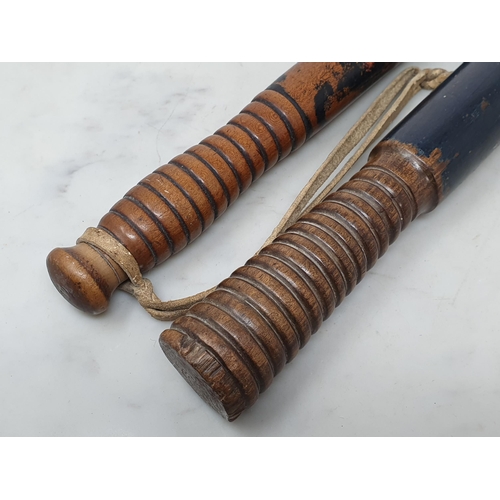 827 - Two 19th Century painted Police Truncheons with worn details and ribbed unpainted grips 1ft 4in L an... 