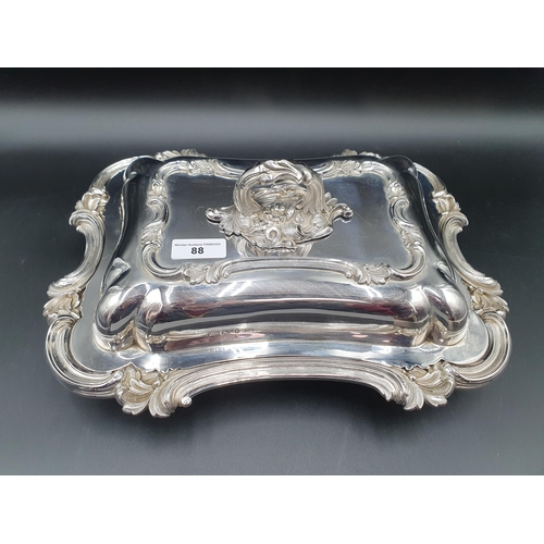 88 - A pair of early Victorian silver oblong Entree Dishes and Covers with scroll rims, ornate leafage ce... 