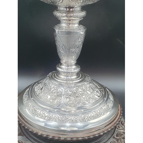 91 - An Impressive Chinese Silver Presentation Trophy with ornate flowering shrub and insect decoration, ... 