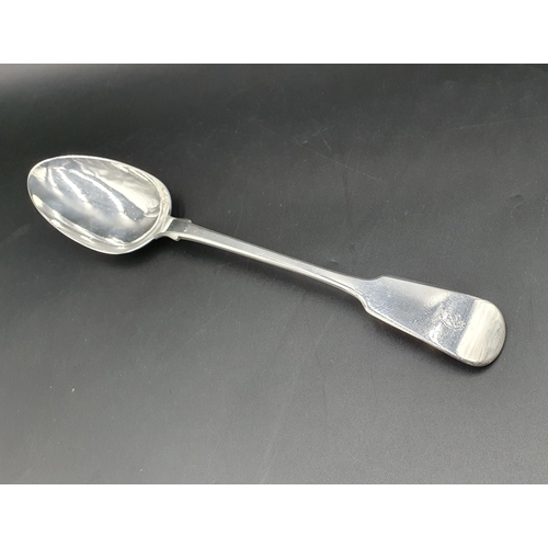 97 - A William IV silver Basting Spoon fiddle pattern engraved initials, London 1834, maker: Mary Chawner