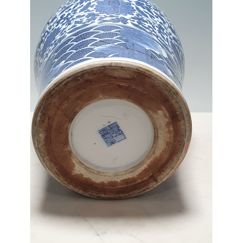 331 - A 19th Century Chinese blue and white Vase of ovoid form decorated panels with motifs and a band of ... 