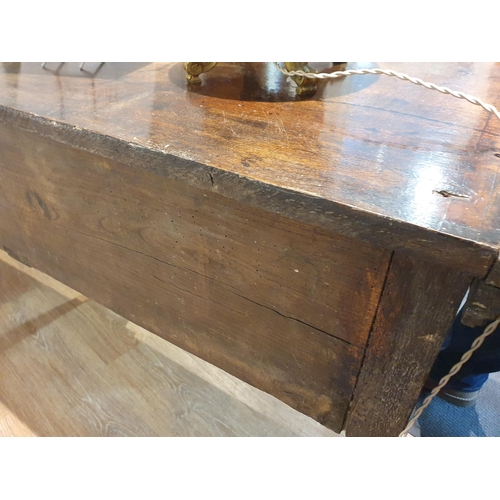 484 - An 18th century oak Dresser Base having cross-banded top above three cross-banded drawers on three c... 