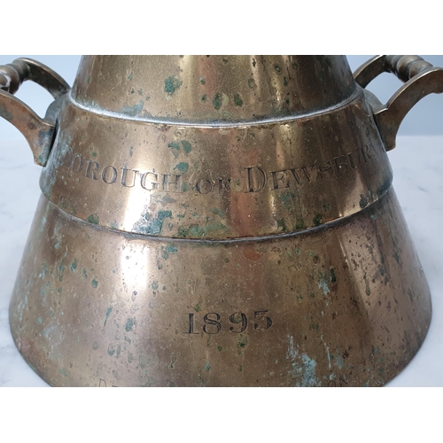 418 - A brass imperial half gallon Measuring Flask of conical outline with cast side handles. Marked 'Boro... 