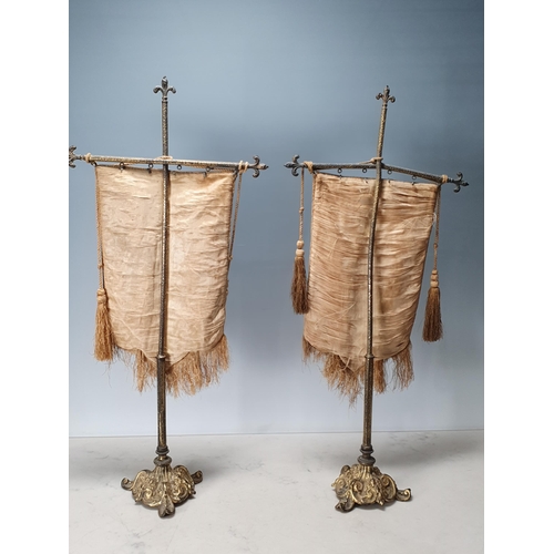 575 - A pair of 19th Century Brass Table Pole Screens with a cruciform top and hanging Tapestry on cast sh... 