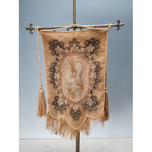 575 - A pair of 19th Century Brass Table Pole Screens with a cruciform top and hanging Tapestry on cast sh... 