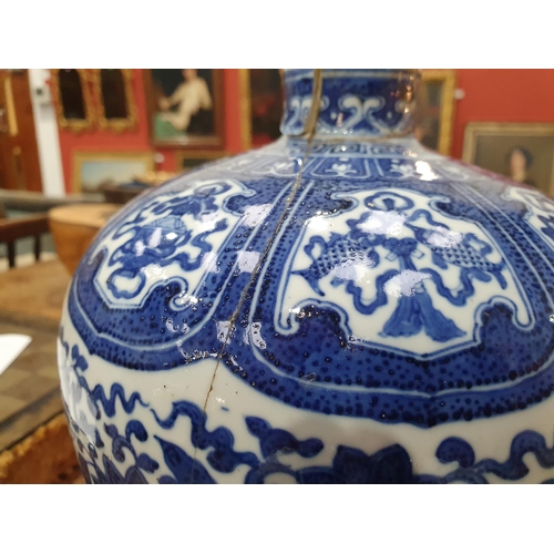 331 - A 19th Century Chinese blue and white Vase of ovoid form decorated panels with motifs and a band of ... 