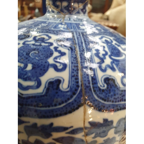 331 - A 19th Century Chinese blue and white Vase of ovoid form decorated panels with motifs and a band of ... 