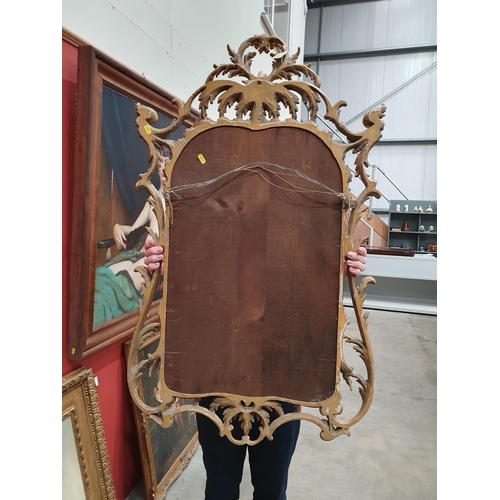 584 - A pair of antique Wall Mirrors in the Georgian manner with elaborate gilt wood, pierced and foliate ... 