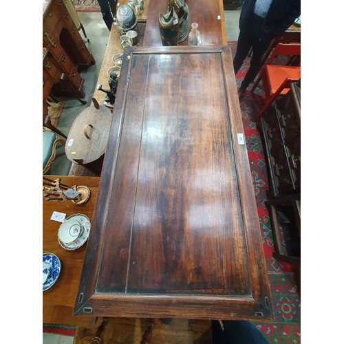 502 - A Chinese hardwood Cabinet on stand, the pair of cupboard doors carved vases and flowering branches,... 