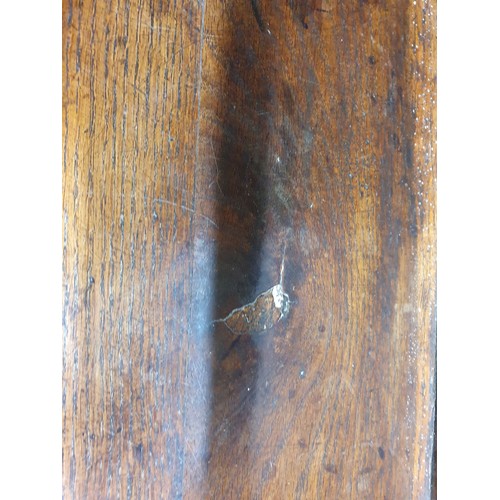 528 - An 18th Century oak Dresser Base with raised back, fitted four crossbanded frieze drawers on turned ... 