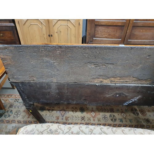 528 - An 18th Century oak Dresser Base with raised back, fitted four crossbanded frieze drawers on turned ... 