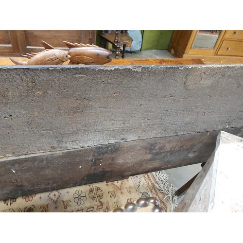 528 - An 18th Century oak Dresser Base with raised back, fitted four crossbanded frieze drawers on turned ... 