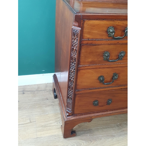 48 - A George III Chest of drawers in the Chippendale manner with glazed Cabinet top, the Chest fitted fo... 