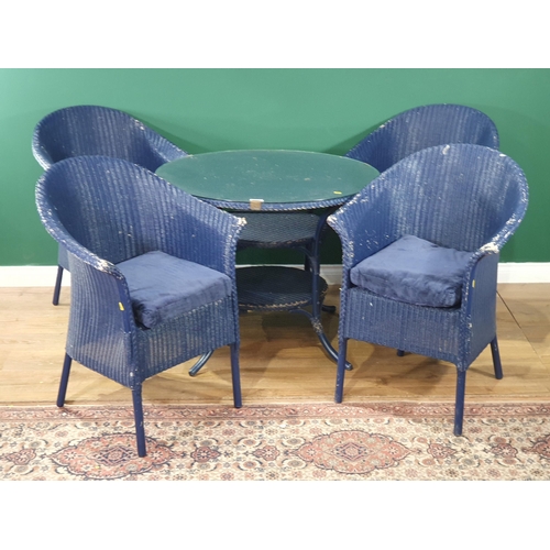 500 - A blue painted circular Lloyd Loom Table and four matching Armchairs. (R6).